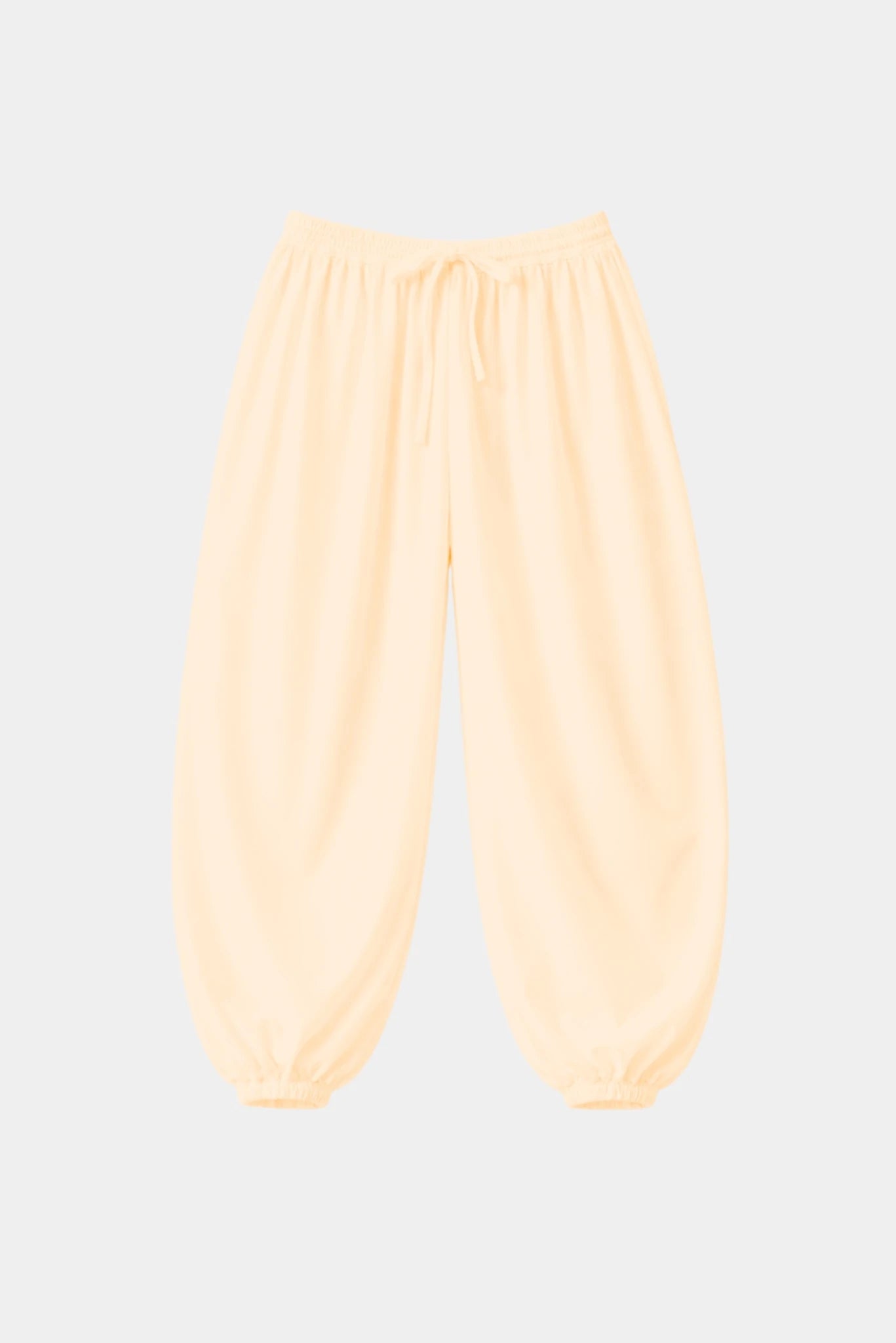Calça bloomer amarelo claro em tricoline com cós elástico e barras franzidas