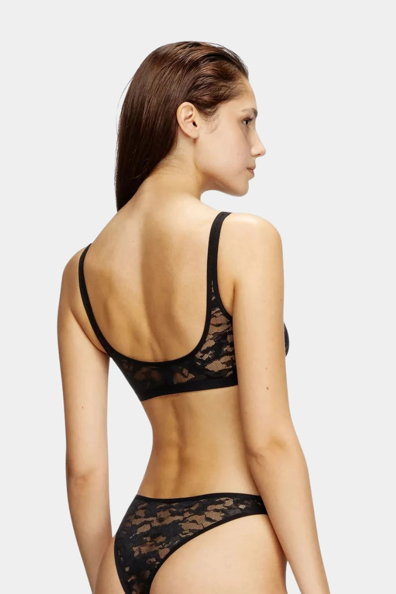 Top Diesel preto em renda transparente com decote nas costas