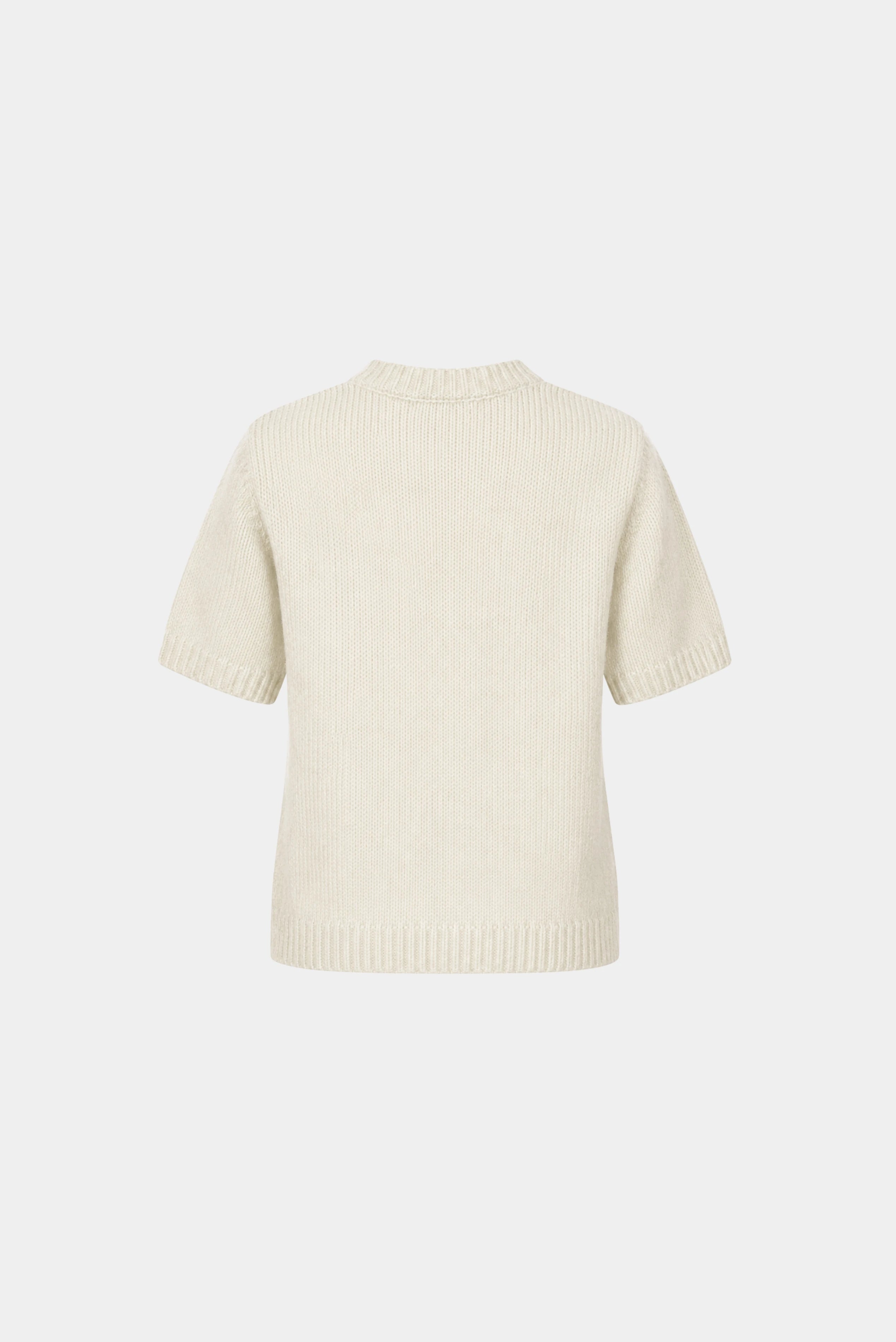 Costas do Top Box Gaia em tricot off white com modelagem reta e mangas curtas