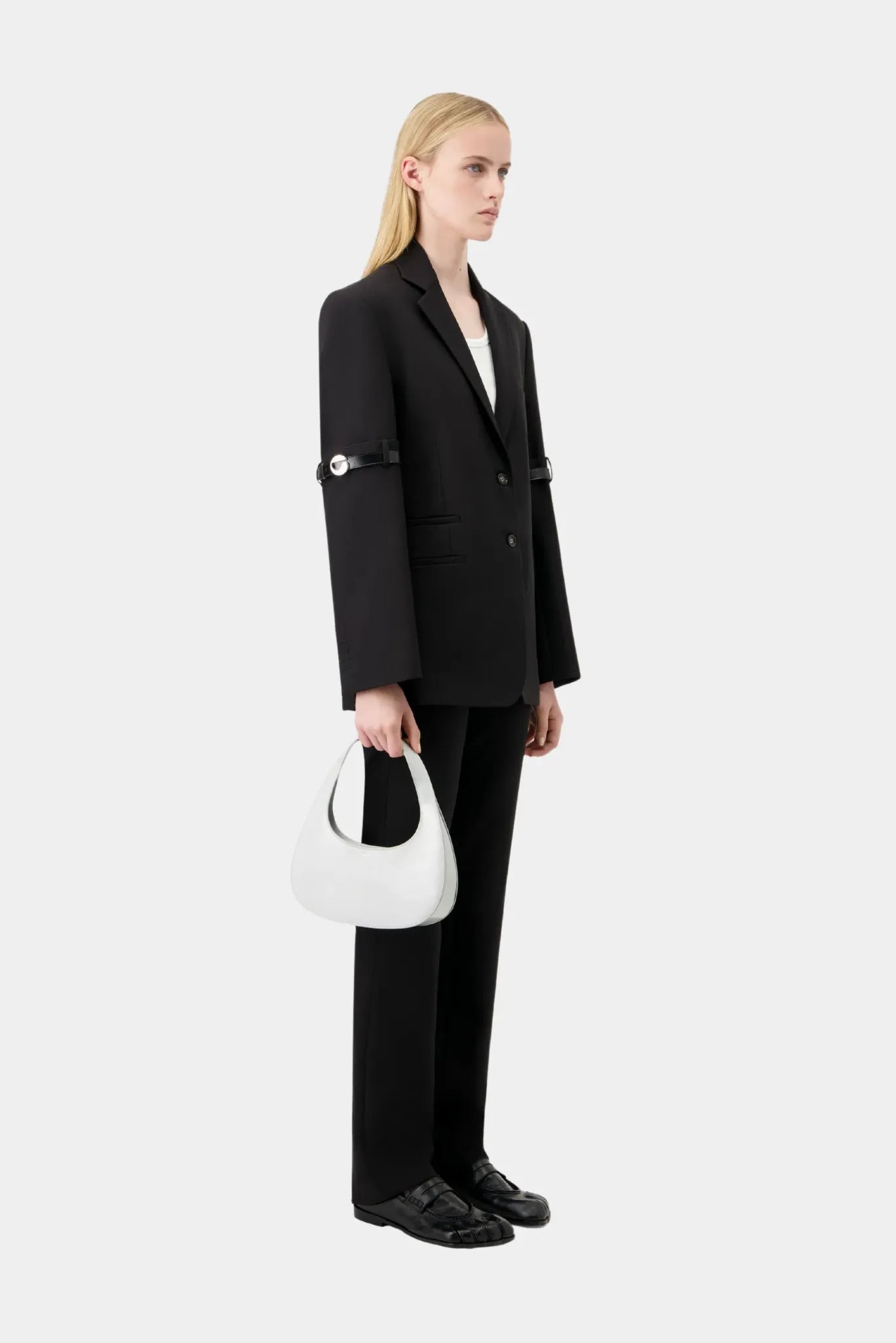 Blazer preto Coperni com corte reto e detalhe metálico nas mangas