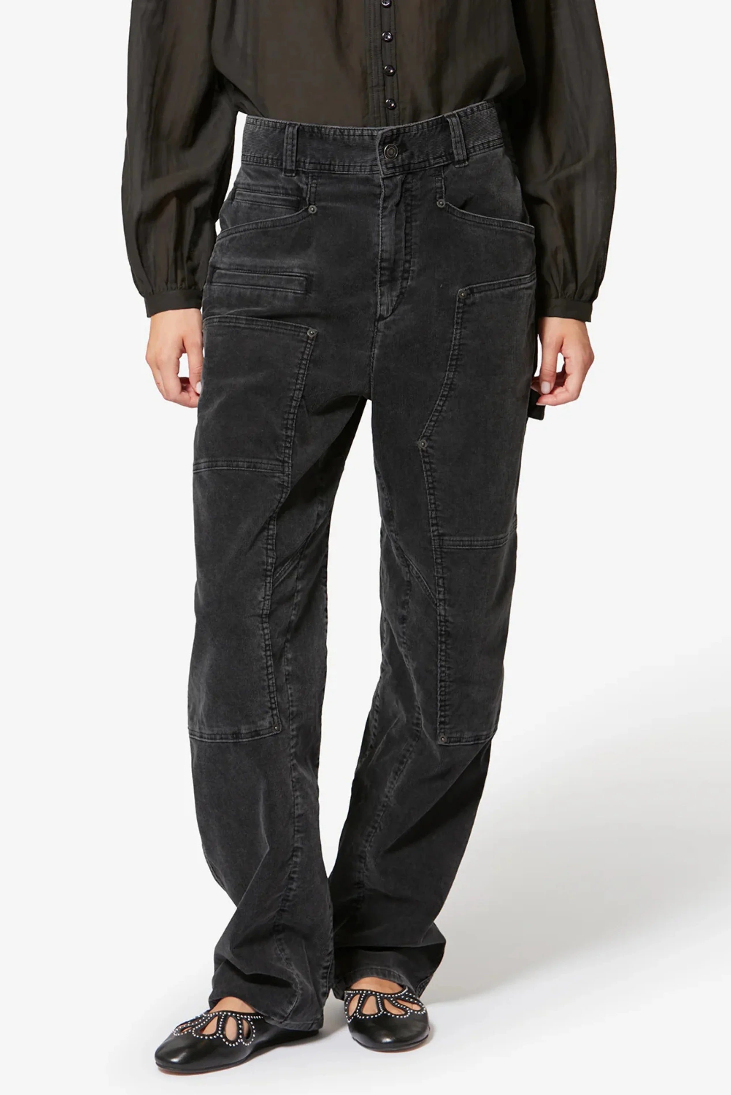 Calça Isabel Marant em veludo cotelê preto com recortes e bolsos frontais