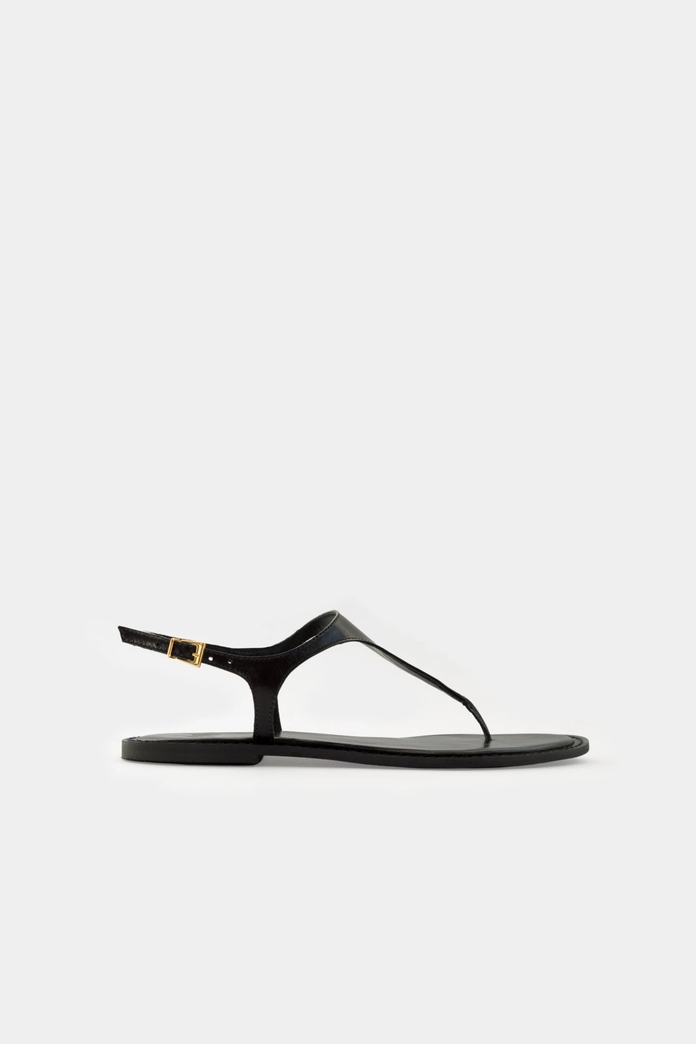 Flat Couro Kita MR preta em couro com design minimalista e sola baixa