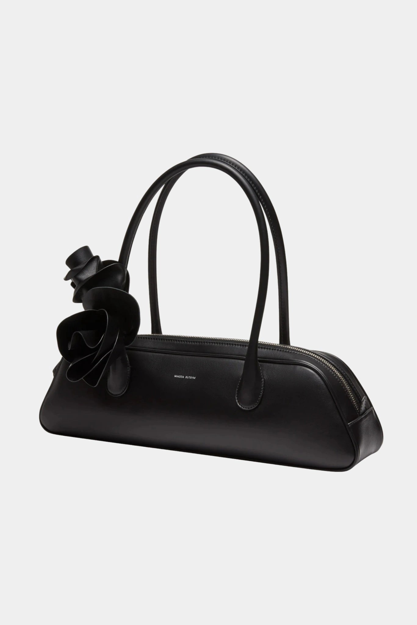 Vista lateral da bolsa Brigitte Magda Butrym em couro preto com design elegante e minimalista