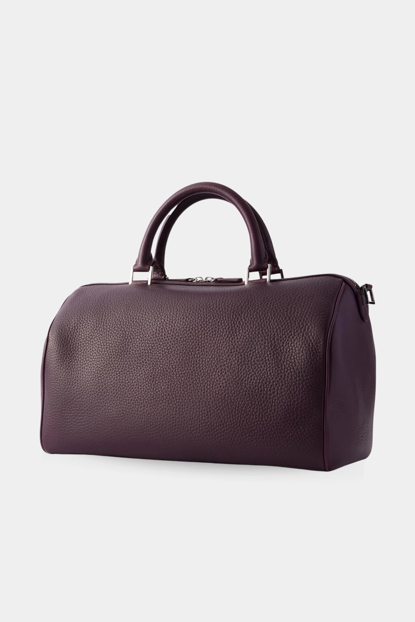 Vista lateral da bolsa Varsovia Magda Butrym em couro granulado vinho escuro e design contemporâneo