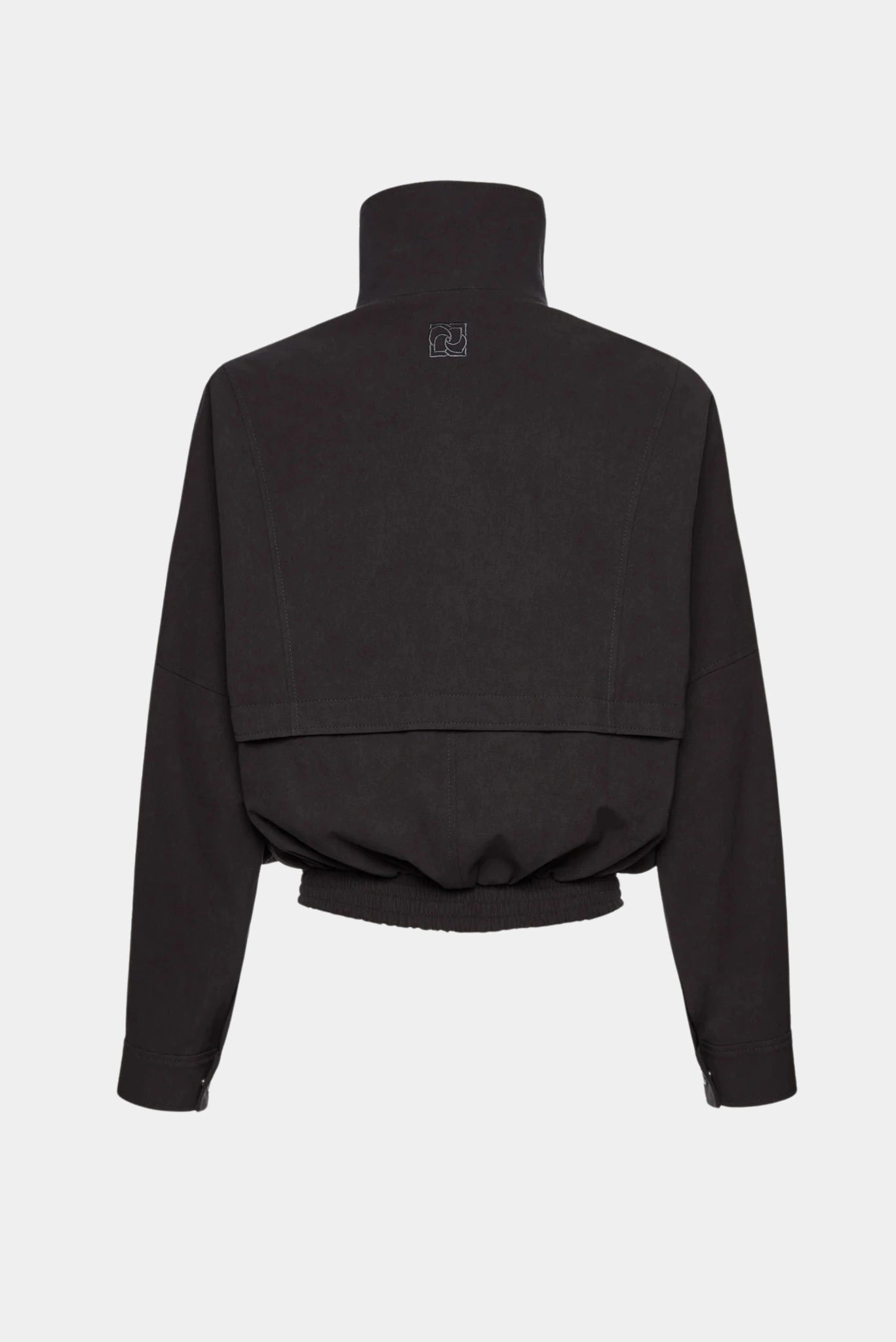 Vista posterior de jaqueta bomber oversized preta da Magda Butrym com caimento amplo e acabamento estruturado