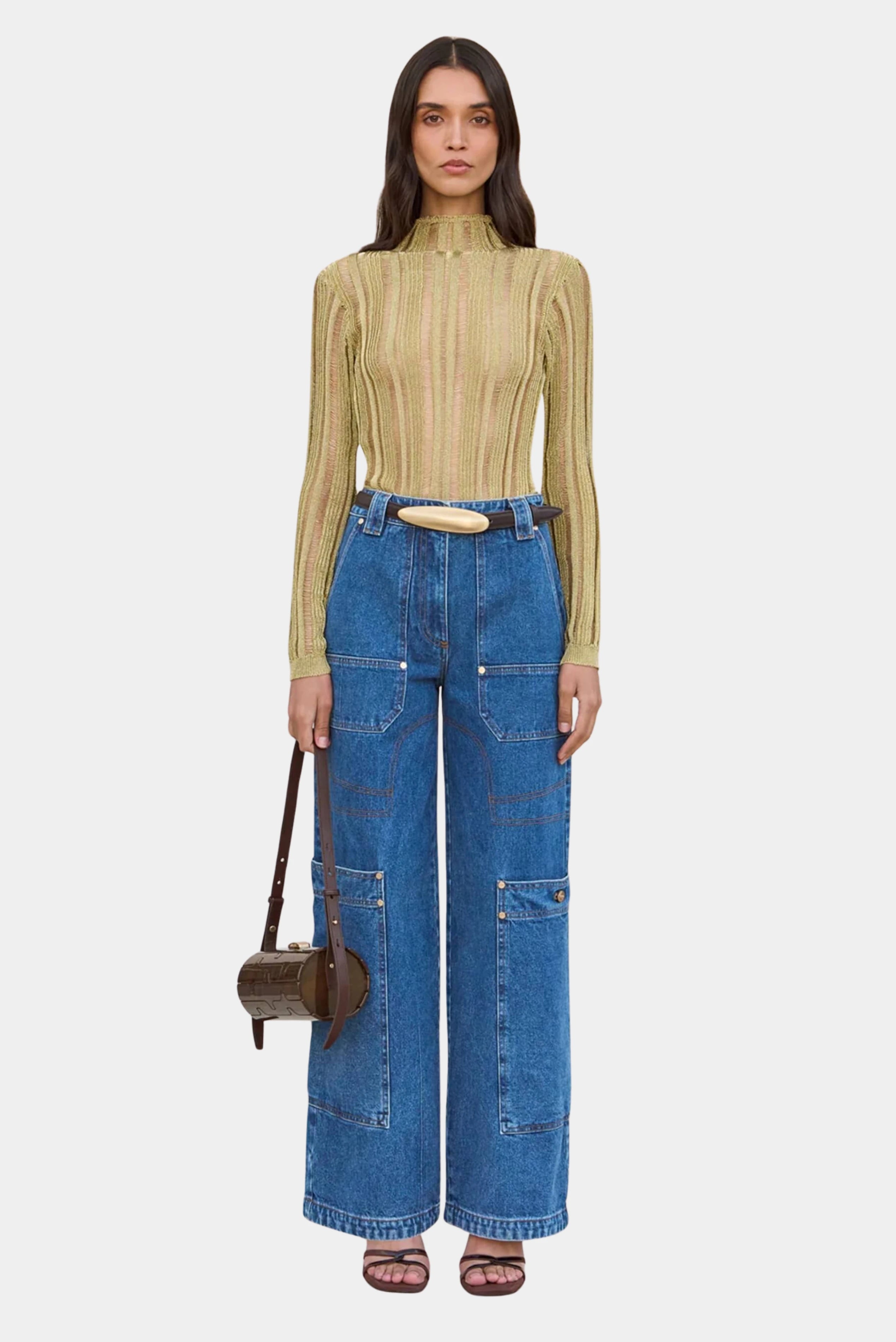 Top Kyla Cult Gaia em tricot dourado transparente com gola alta e mangas longas