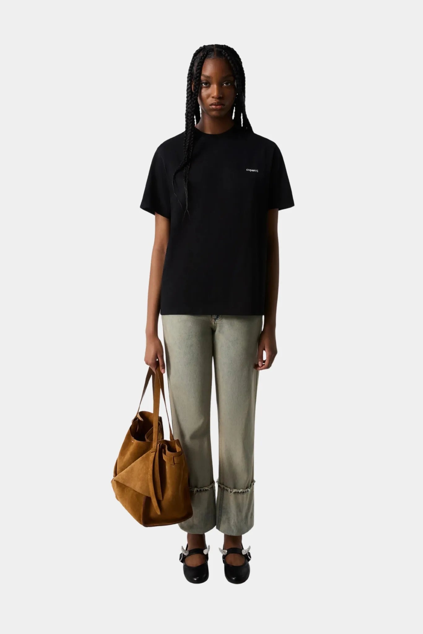 Camiseta feminina preta Coperni em estilo minimalista com caimento solto
