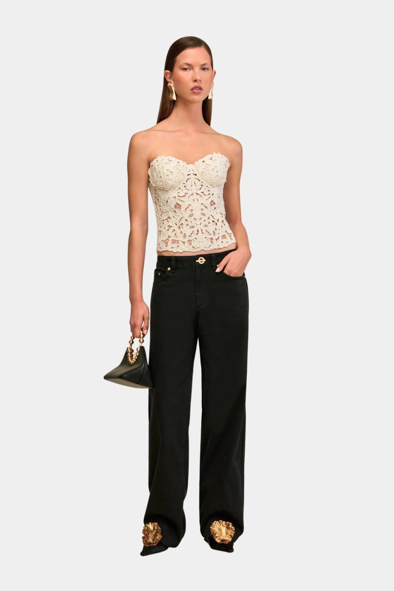 Top feminino Cult Gaia com transparência floral e busto estruturado em look sofisticado
