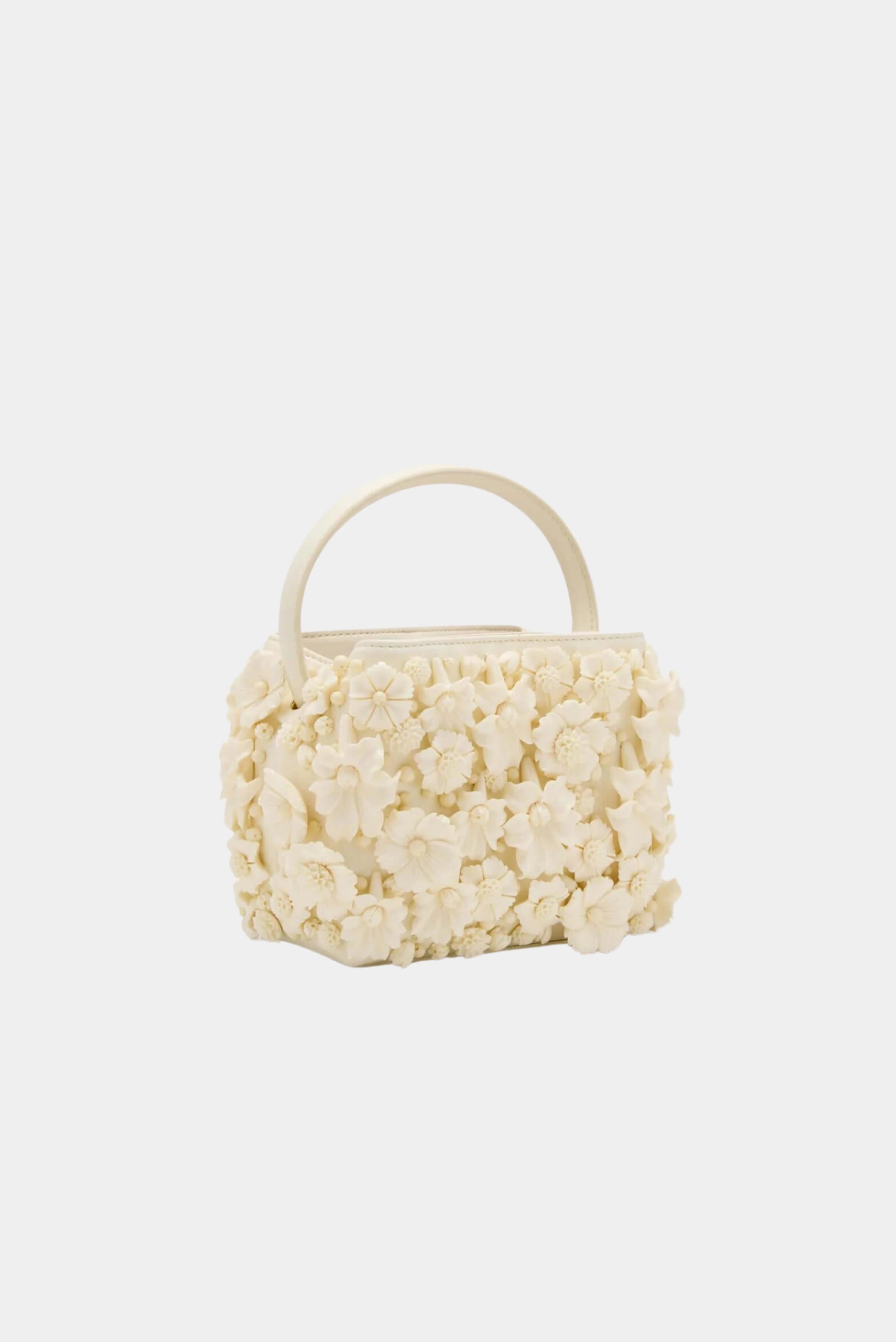 Bolsa Cult Gaia floral off-white com textura tridimensional e alça rígida