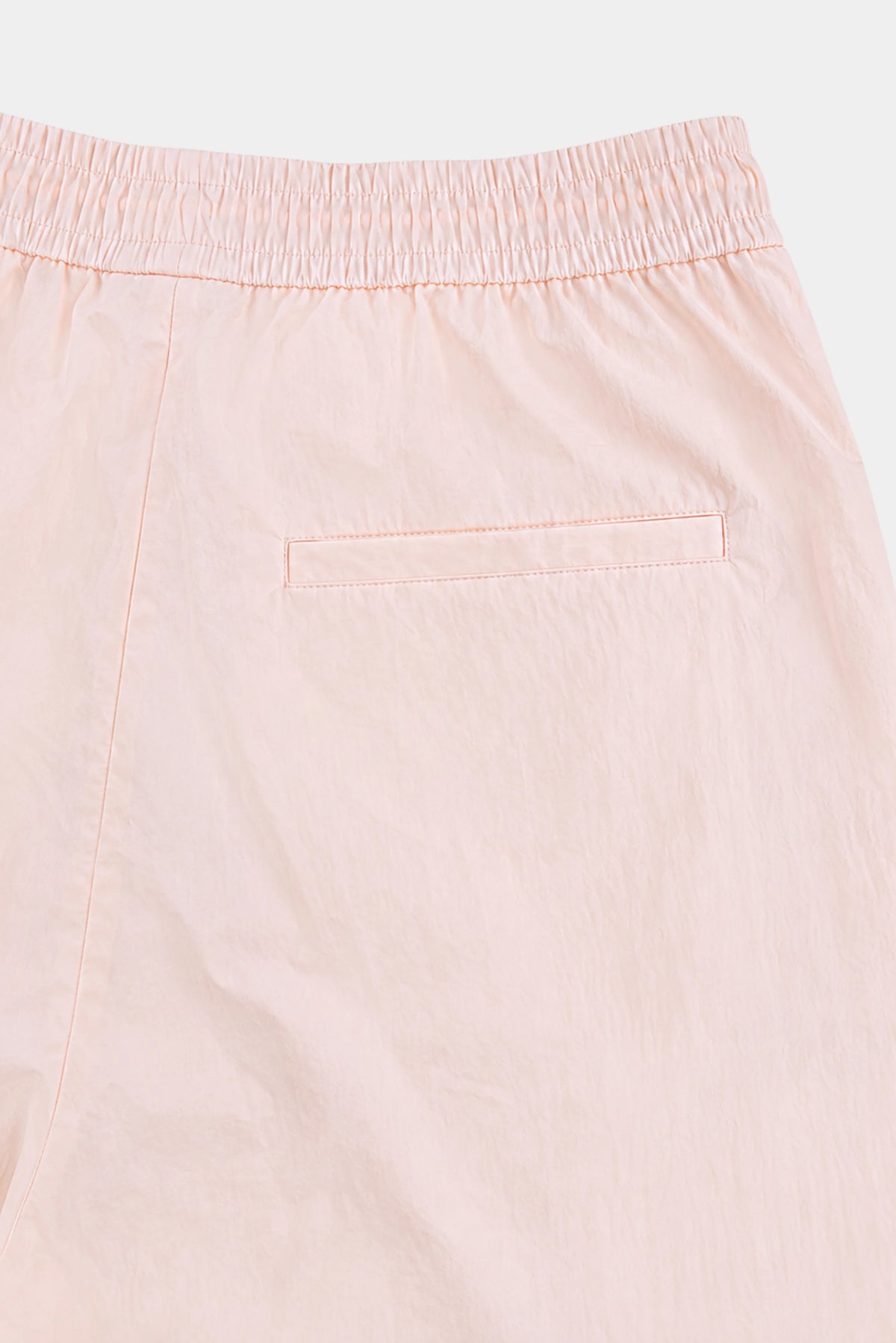 Detalhe traseiro da Calça Tepana Jogger rosa-claro com cintura elástica e bolso embutido
