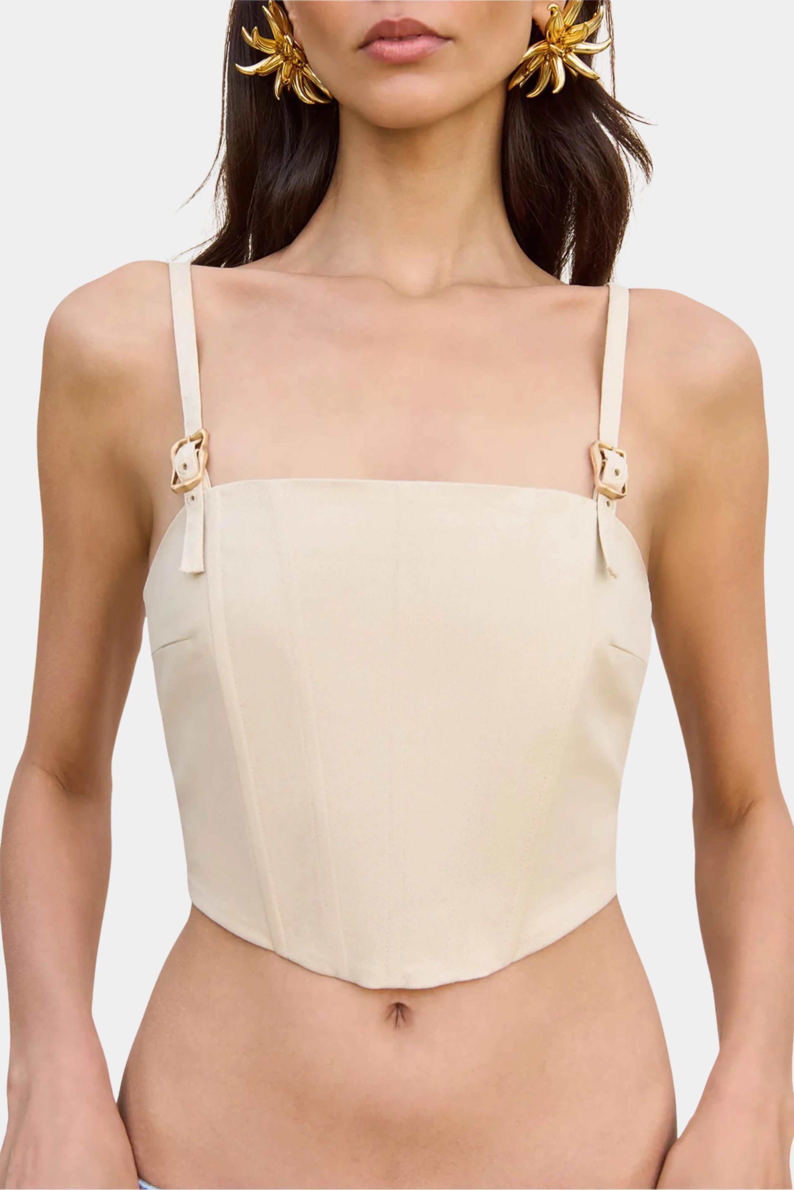 Top cropped bege Cult Gaia com modelagem estruturada e alças ajustáveis