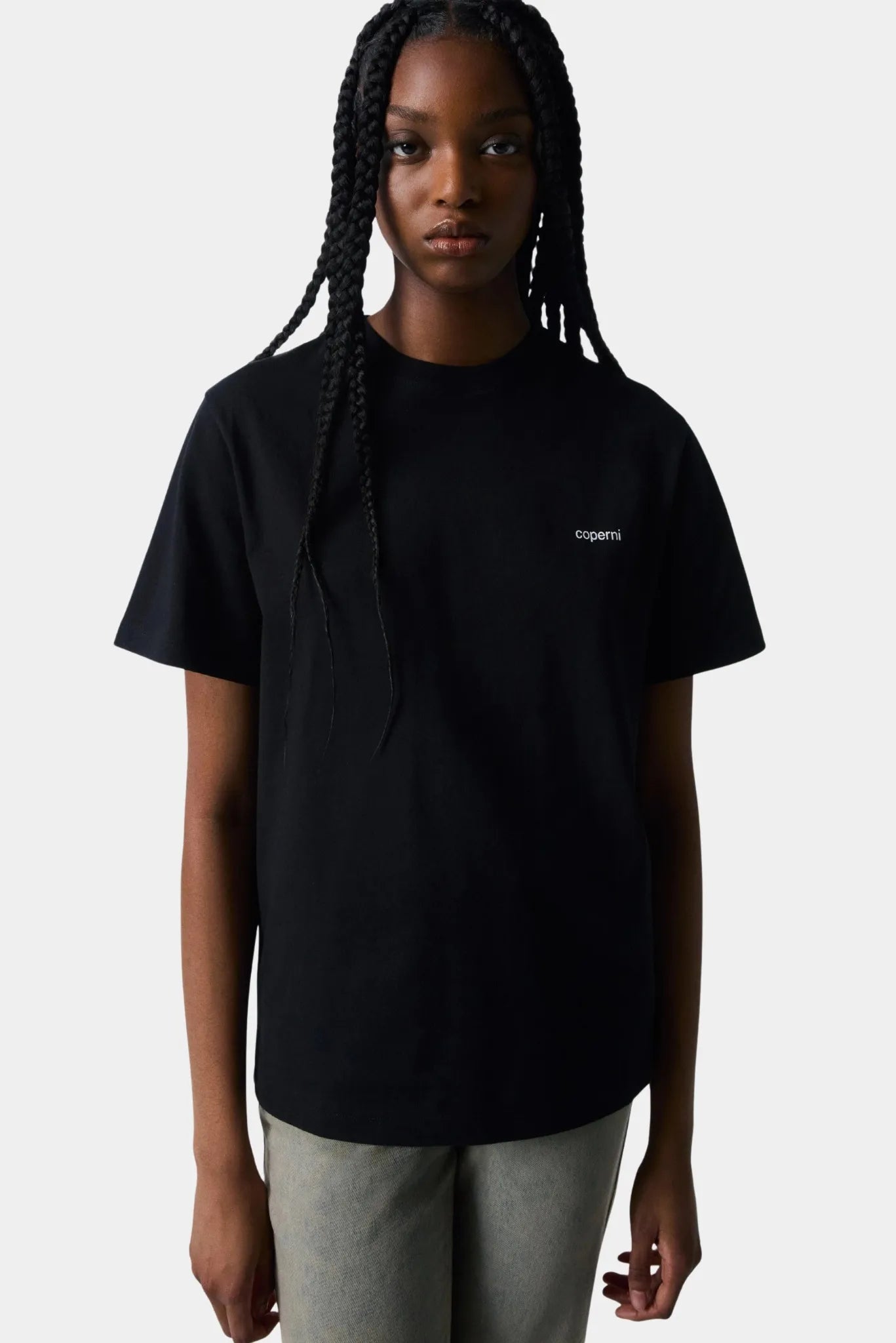 Camiseta preta Coperni de manga curta com logo frontal discreto