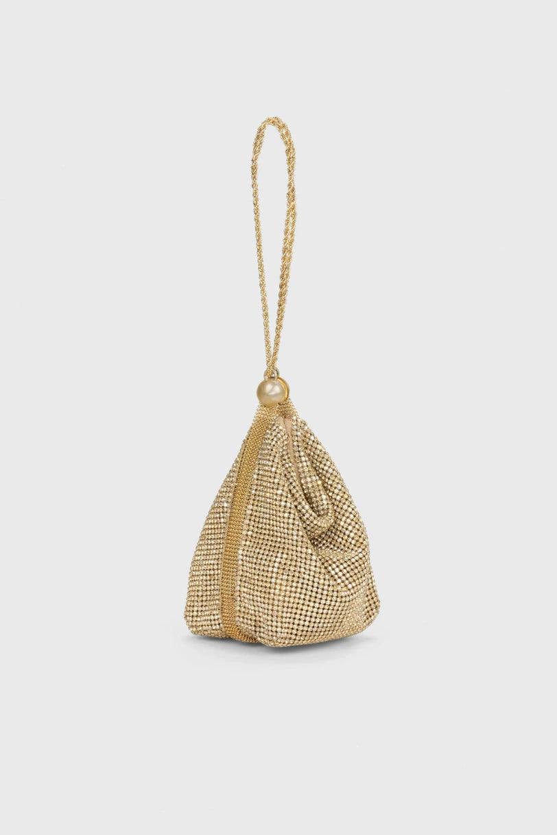 Bolsa Rue Cult Gaia dourada em vista lateral com fechamento por botão magnético